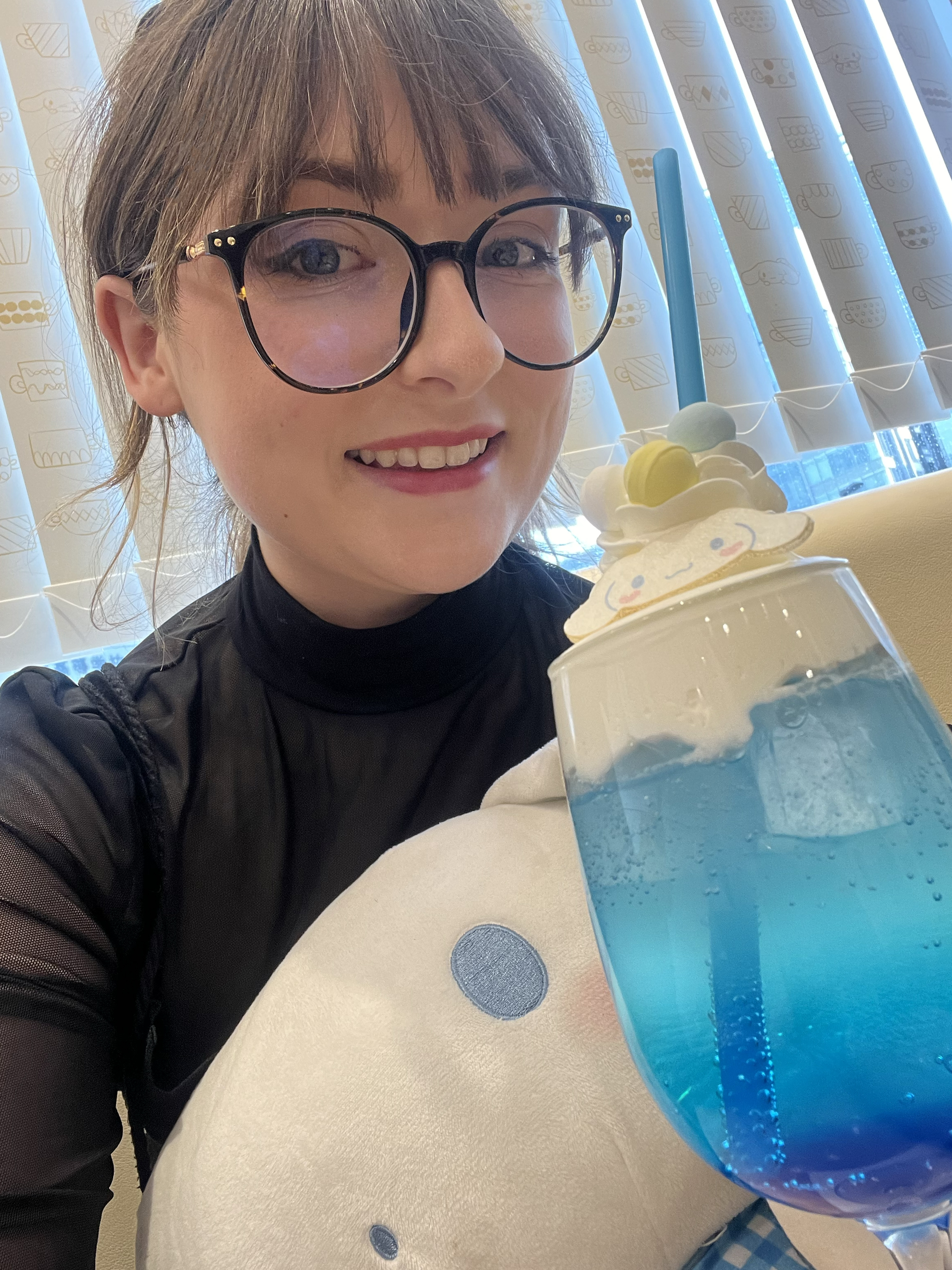 woman with blue drink