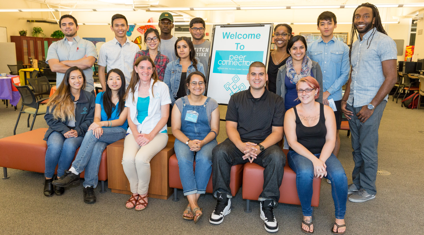 group photo of students and staff at the Peer Connections Center