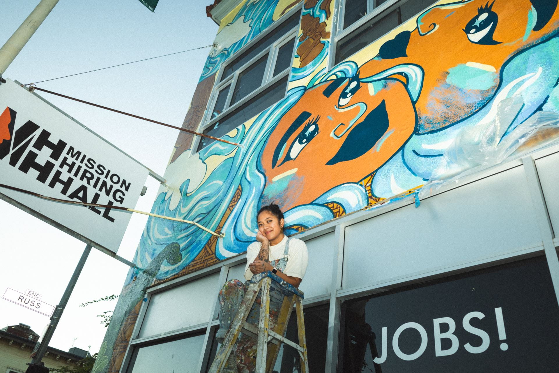 Mural artist at SJSU.